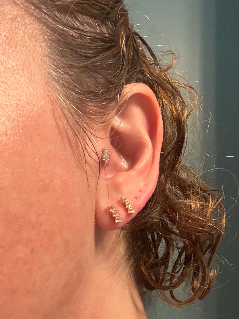 Mejuri white sapphire line stud earrings in gold